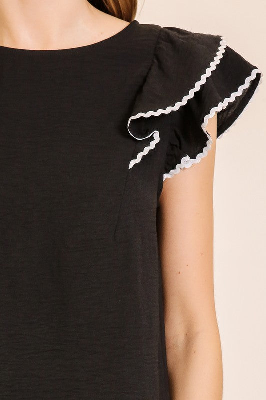 Blusa con contraste y olan en manga