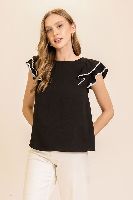 Blusa con contraste y olan en manga