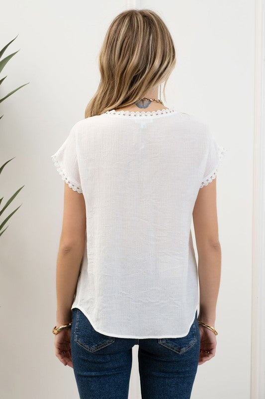 Blusa bordada manga corta