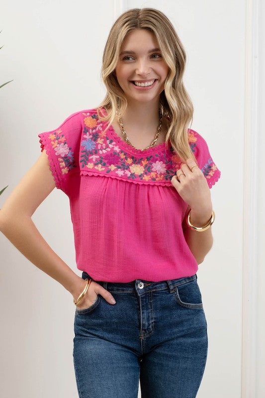 Blusa bordada manga corta