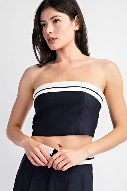 Top navy con contraste