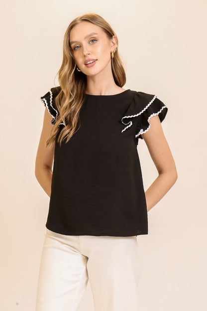 Blusa con contraste y olan en manga