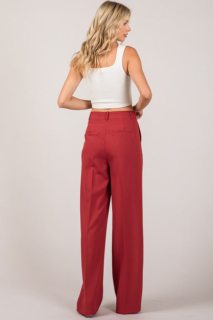 Pantalón wide leg con trabilla y botón