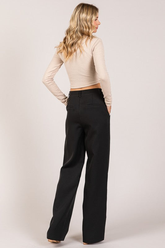 Pantalón negro con contraste
