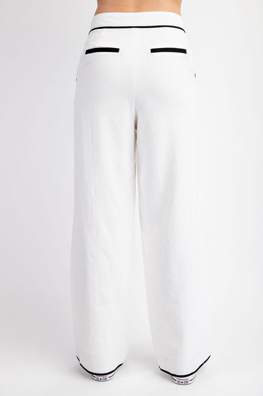 Pantalón lino con contraste negro